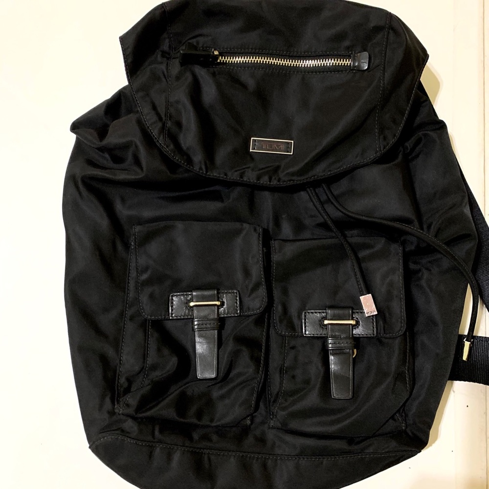 Tumi Tahiti Black Backpack. With 2 front pockets.